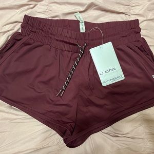 Lorna Jean Easy Breezy running shorts NWT size Small “Pinot”. Color